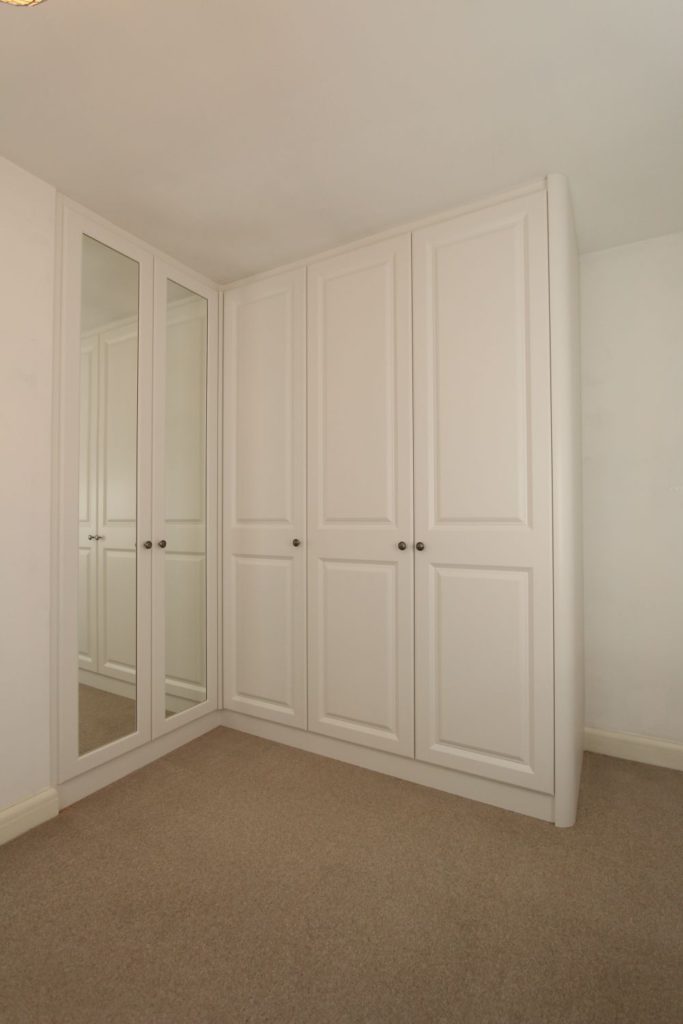 Traditional white corner fitted wardrobe, Hertfordshire