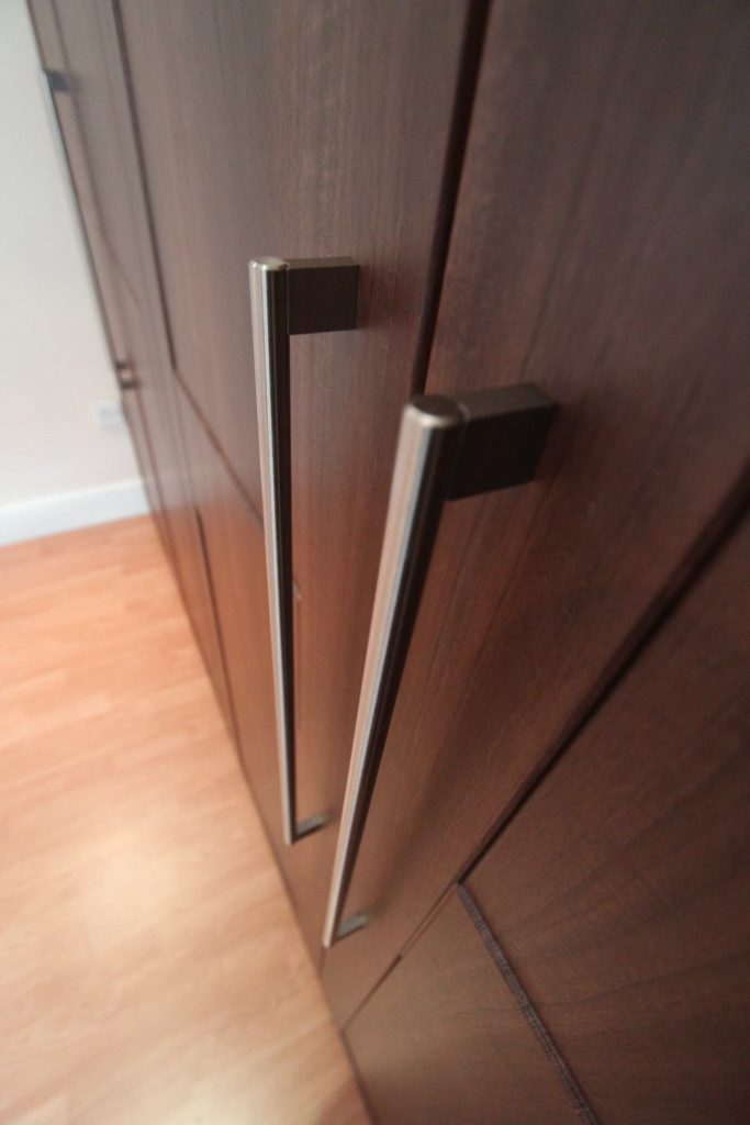Walnut shaker doors with chrome bar handles, Loughton, Essex, IG10